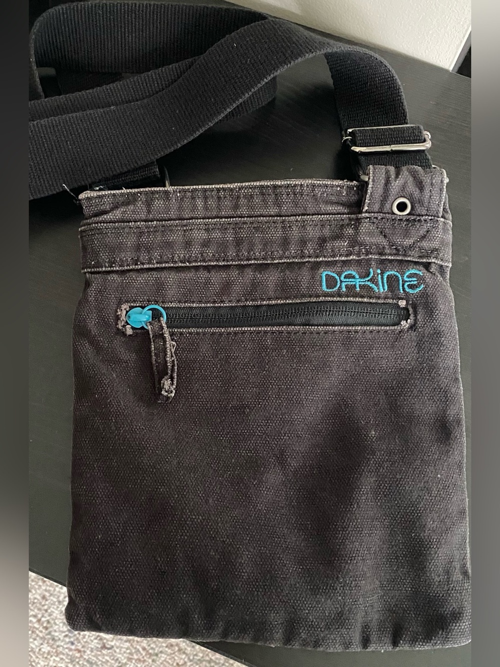 Dakine Black Messenger Bag with Turquoise Accent